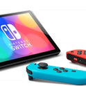 Console Nintendo Switch (modèle OLED) avec manettes Joy-Con bleu néon / rouge néon